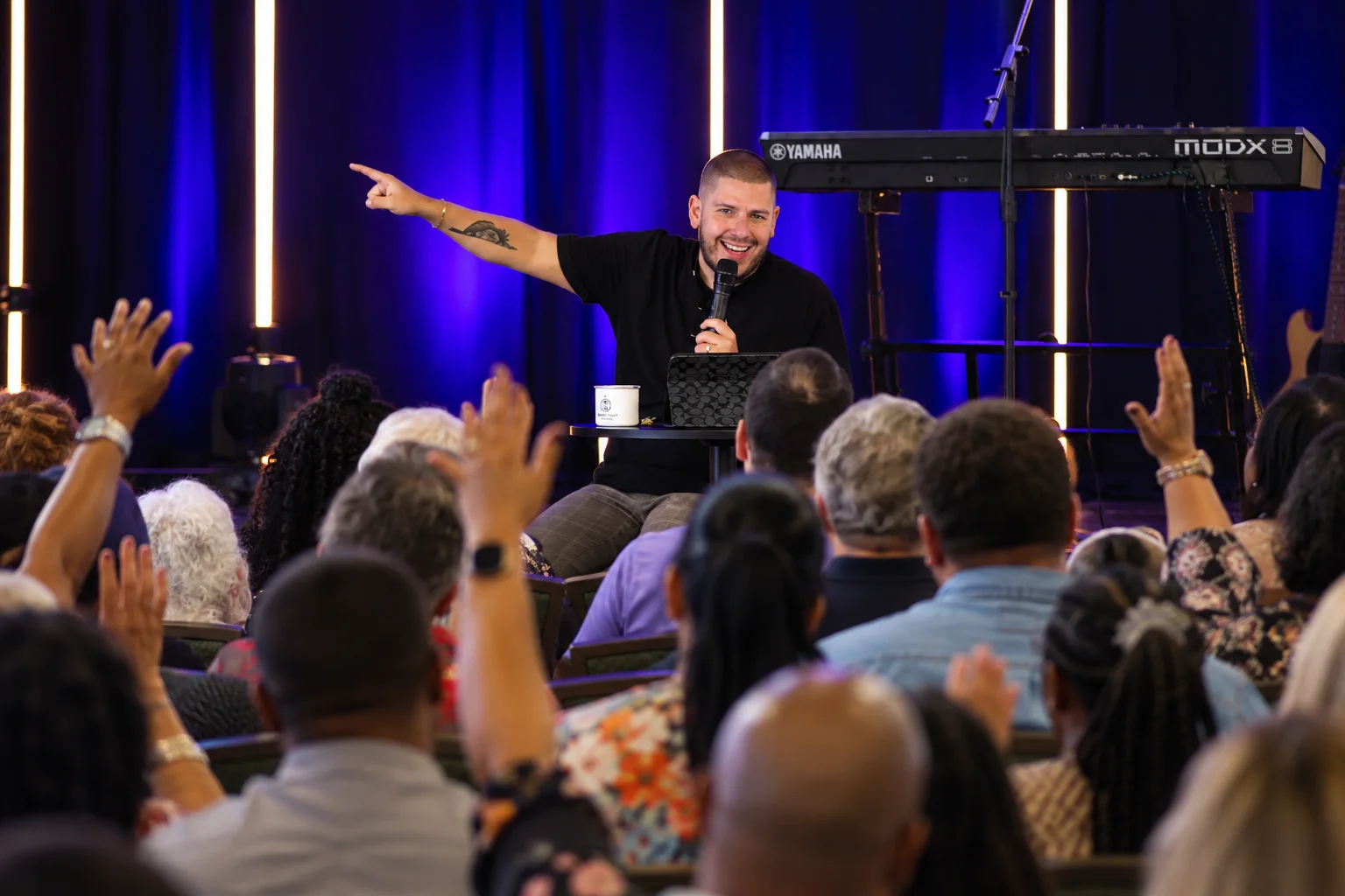 Bryan Rambler preaching to a congregation
