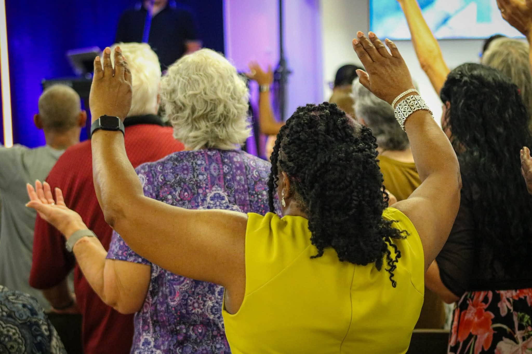 Triumphant Church congregation worshipping together